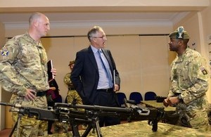 The Minister is briefed on the workings of the General Purpose Machine Gun (GPMG) used by the Reservists of 6 SCOTS.