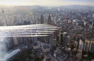 The Red Arrows flying past the PETRONAS Twin Towers
