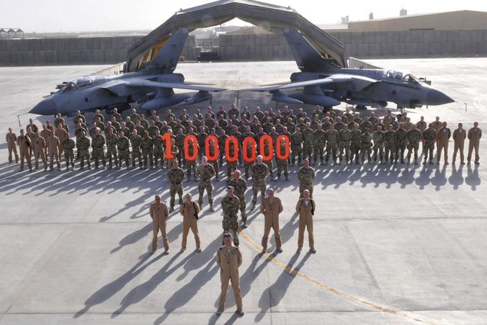 617 Squadron ground and aircrew at Kandahar Airfield, Afghanistan, commemorate one million hours flown by the Tornado GR Force  