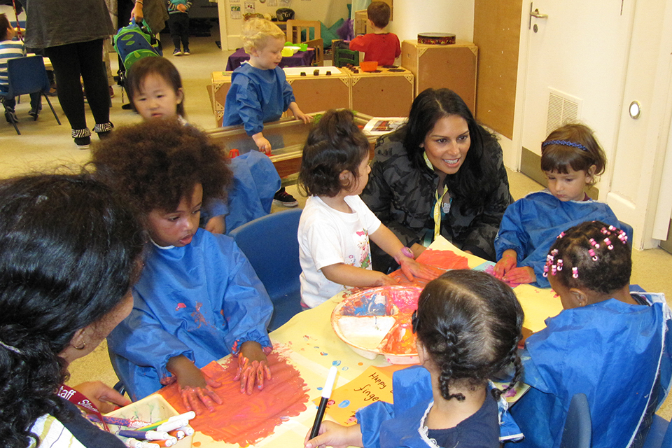 Treasury minister Priti Patel visits nursery to discuss Tax Free Childcare with parents