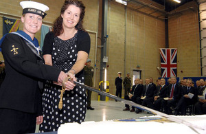 AET Charlotte Cole, of the Mobile Aircraft Support Unit (left), and Mrs Joanne Osmond, wife of CO Fleet Forward Support (Air) mark the opening of the refurbished Unicorn building.