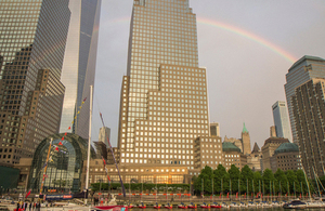 After a rainy evening, a rainbow appeared over the Freedom Tower and the GREAT Britain yacht.