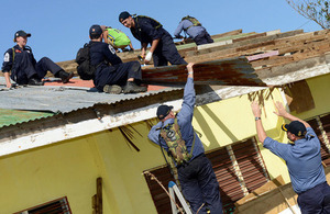 Members of HMS Daring's crew repairing the Hagdan school's roof [Picture: Leading Airman (Photographer) Keith Morgan, Crown copyright]