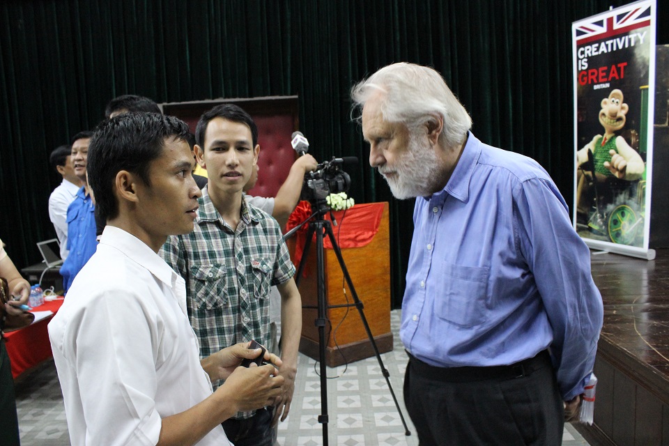 Lord Puttnam with young Lao filmmakers