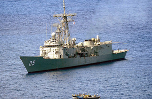 HMAS Melbourne closes in on a suspected pirate vessel [Picture: ABIS Jayson Tufrey, Commonwealth of Australia]