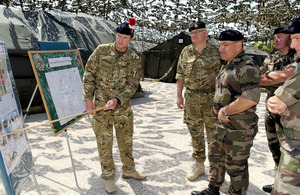 Brigadier Paul Nanson (left), Commander 7 Armoured Brigade, briefs General Sir Peter Wall, Chief of the General Staff (2nd left), and General Elrick Irastorza, Chef d'Etat Major de l'Armée de Terre (3rd left), on Exercise Flandres