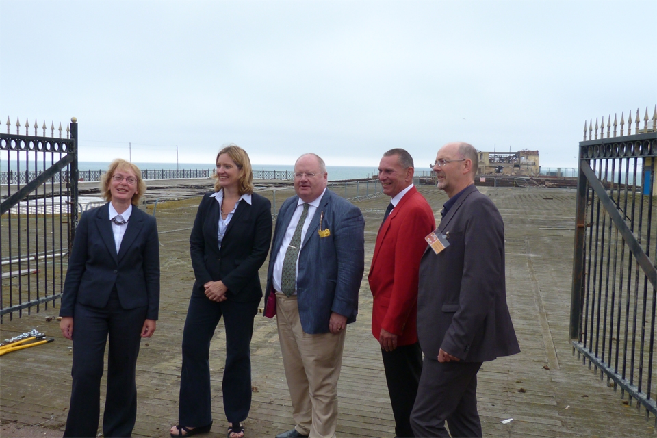 Local MP Amber Rudd, Eric Pickles, Simon Opie Chief Executive of Hastings Pier Charity, and others at opening of work on Hastings Pier.