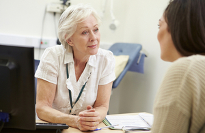 Consultant meeting with patient by Monkey Business Images