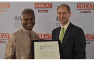 Kushil Gunasekera receiving his Commonwealth Point of Light Award from His Royal Highness The Prince Edward, Earl of Wessex