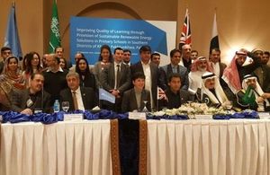 DFID Head, Joanna Reid and KP education Minister, Atif Khan with other guests at the signing ceremony.