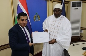 Lord Ahmad handing the Commonwealth Heads of Government Meeting invitation to President Barrow