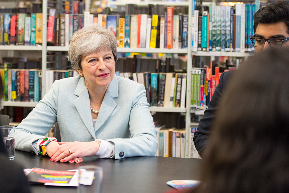 PM Theresa May meets schoolchildren on a day of visits as she launches a review into post-18 education and funding.