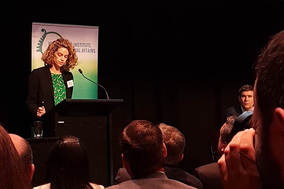 Laura Clarke presenting her speech at the NZIIA