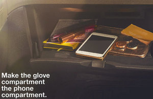 Mobile phone in a car glove compartment.