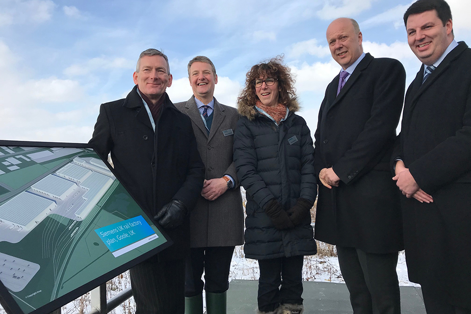 Transport Secretary with Andrew Percy, MP for Brigg and Goole and Siemens staff at the site of the planned train factory in Goole.