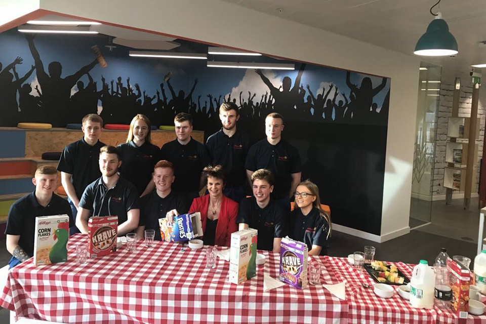 Apprenticeship and  Skills Minister Anne Milton sharing breakfast with apprentices from Kelloggs
