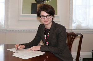 Minister for the Constitution signs the Regulations