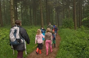 People walking through Wendover Woods