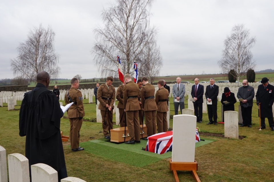 Members of the 3 Rifles Regiment lower the coffin of the unknown Durham Light Infantry soldier, Crown Copyright, All rights reserved