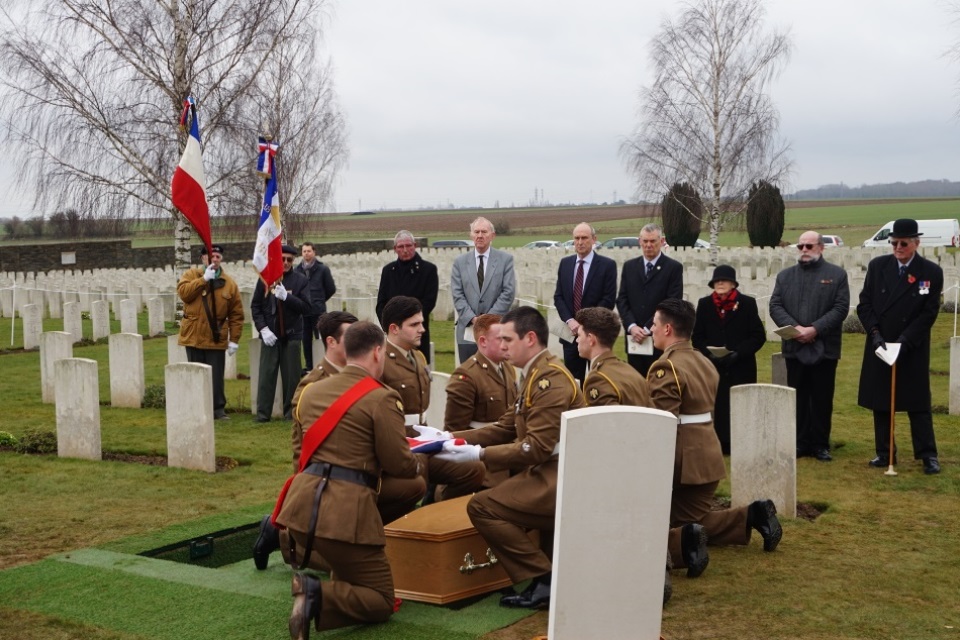 Royal Anglians Regiment folding the flag for the unknown Bedfordshire soldier, Crown Copyright, All rights reserved