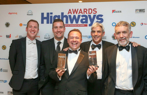 Team members receiving an award