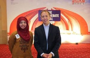 The British High Commissioner, Thomas Drew with the winner of the Great Debate, Muhiba Ahmed.