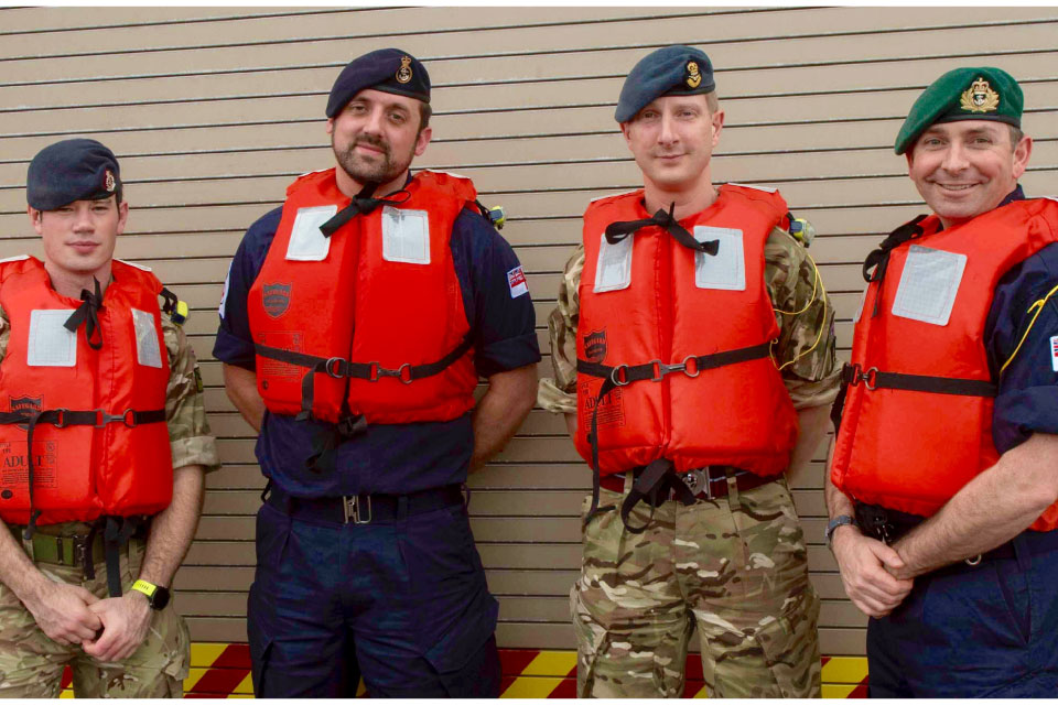 L-R Corporal Phillips, POMA Nicholl, Flt Lt Lowry and Lt Cdr Middleton.