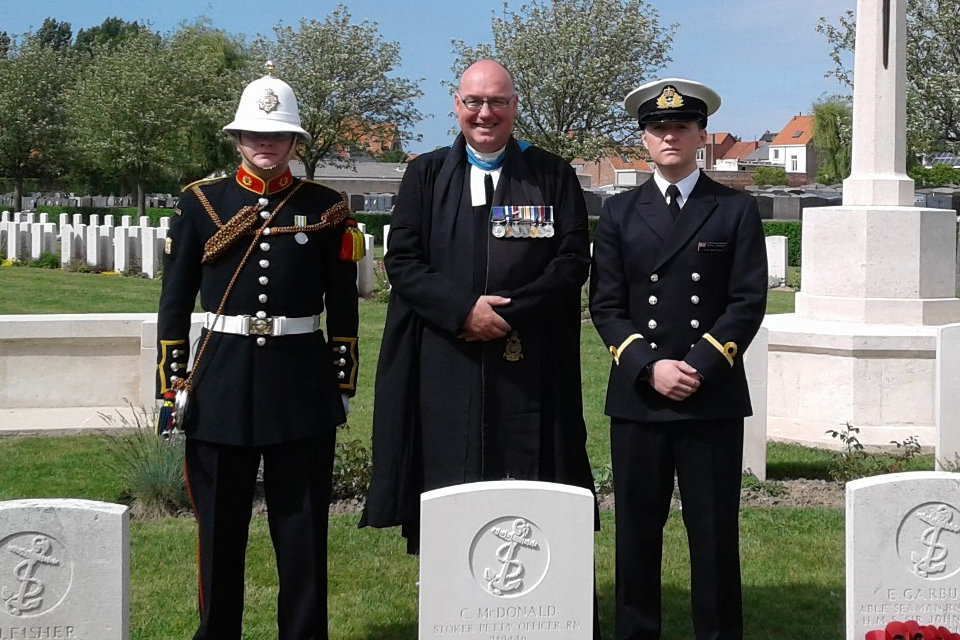 Reverend (Professor) Scott J S Shackleton is joined by Navy representatives by PO McDonald’s new headstone, Crown Copyright, All rights reserved