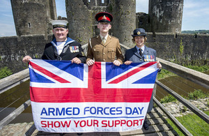 Armed Forces Personnel with the Armed Forces Day Flag