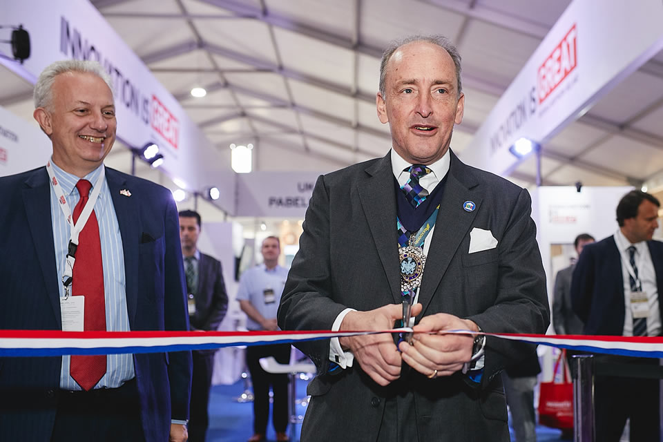Picture of Charles Bowman cutting the tape to inaugurate the British Pavilion at Expomin 2018.