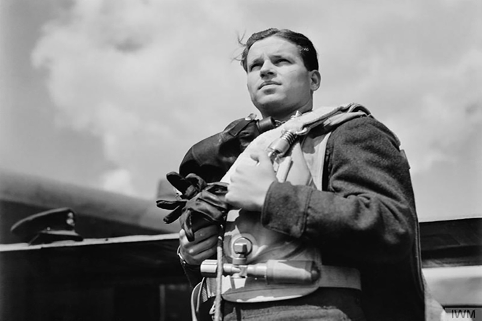 Wing Commander Guy Gibson, while Commanding Officer of No 617 Squadron RAF, wearing flying kit.