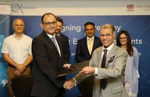 The signing of two new equity investment deals between CEO Karandaaz Pakistan, Ali Sarfraz and the owner of Equity Investments.