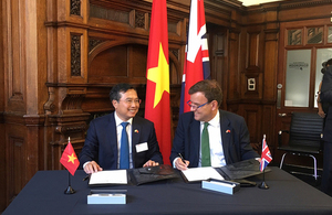 Picture of Greg Hands and Vice-Minister Vuong Hoang Quoc.