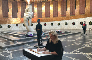 DHM Lindsay Skoll signs memorial book