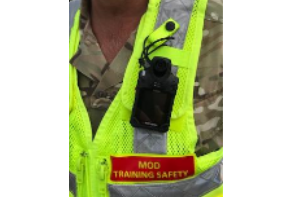 New hi-vis vest and body camera aimed at identifying repeat offenders. Crown Copyright, MOD 2018.