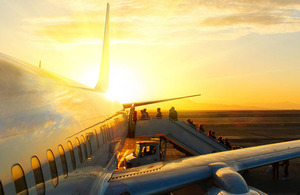 Passengers boarding a plane.