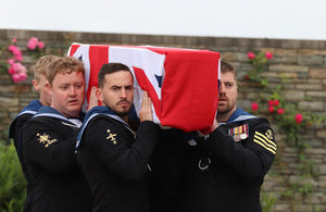 Members of the Royal Navy, who provided the bearer party and firing party, take AB Robertson to his final resting place, Crown Copyright, All rights reserved