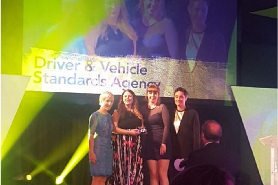 Image of DVSA staff collecting the CIPR Excellence Award