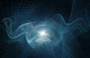Blue light and waving lines across a black background