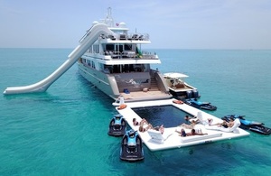 Picture of a superyacht with a selection of bespoke inflatables