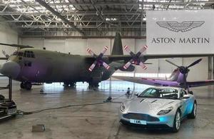 picture of Aston Martin Car in front of jets at Aston Martin