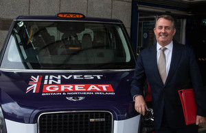 Liam Fox with LEVC electric taxi