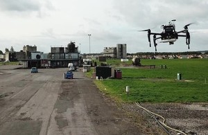 Drone performing trials over a test ground.