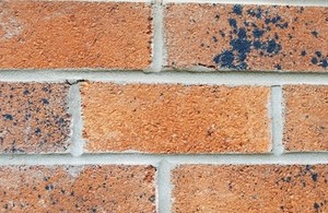 A close up of a brick wall