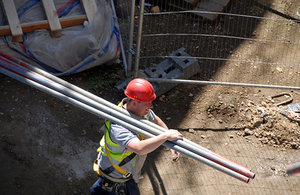 Builder with pipes.