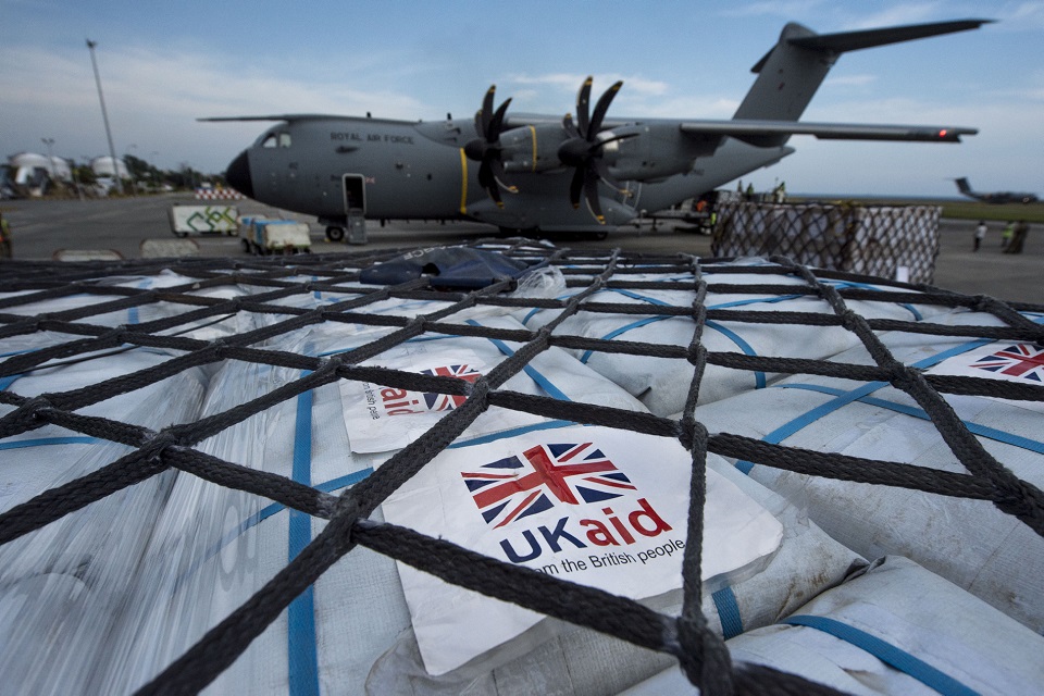 UK aid being unloaded at the international relief centre at Balikpapan.
