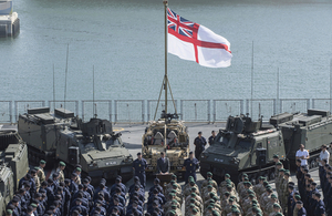 Mark Lancaster speaking on board HMS Albion.