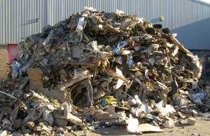 A pile of waste that has been dumped illegally outside a business
