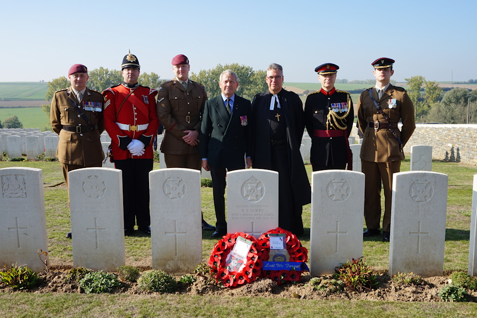 Members of the RAMC, The Mercian Regiment and The KRRC Association, at the graveside of Second Lieutenant Surry, crown copyright all rights reserved.