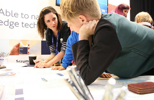 A UKHO STEM Ambassador talking to the public at the Big Bang Fair, Weston Super-Mare